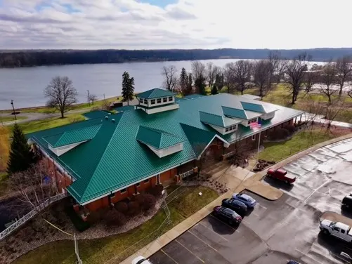 Tarping and dry-in on a Meridian-Kessler commercial roof